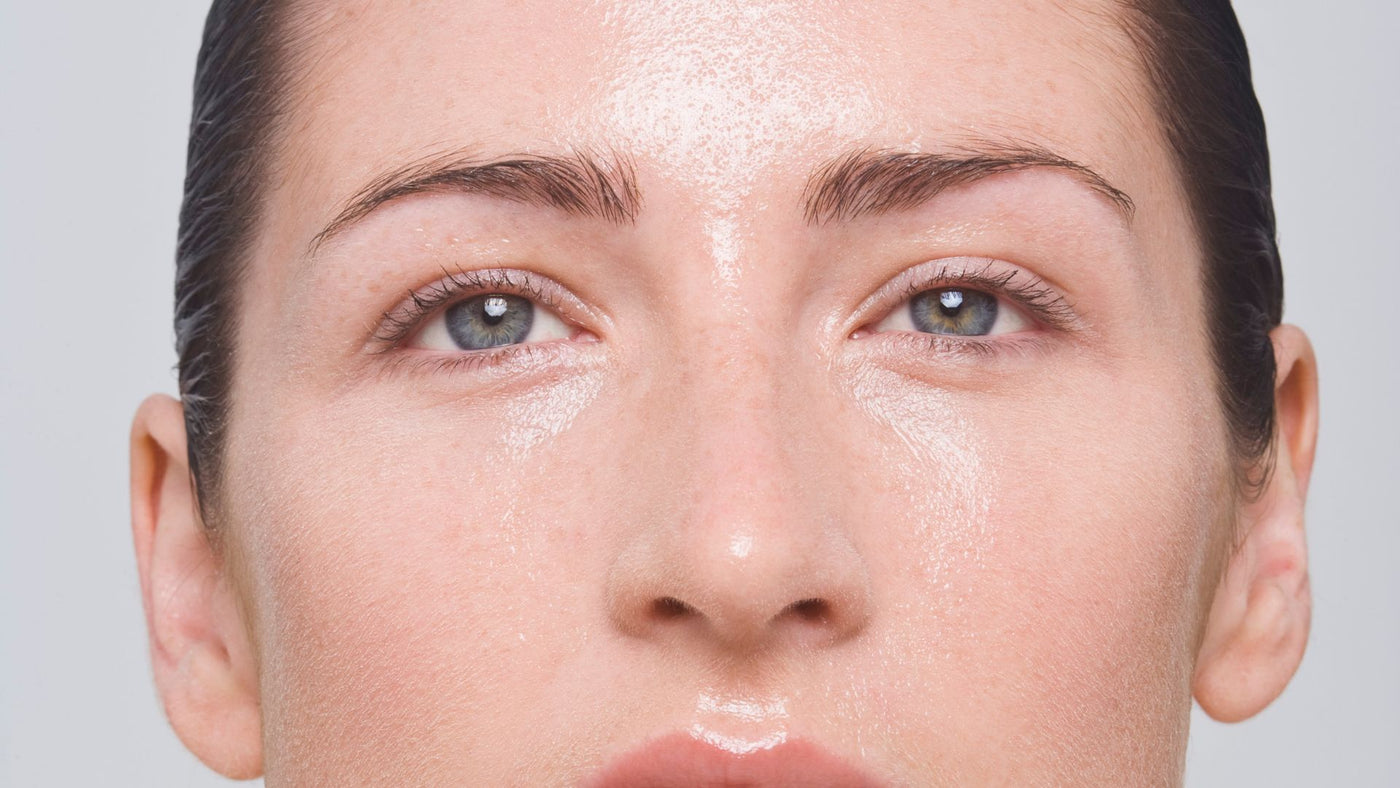 A woman's face with oily skin
